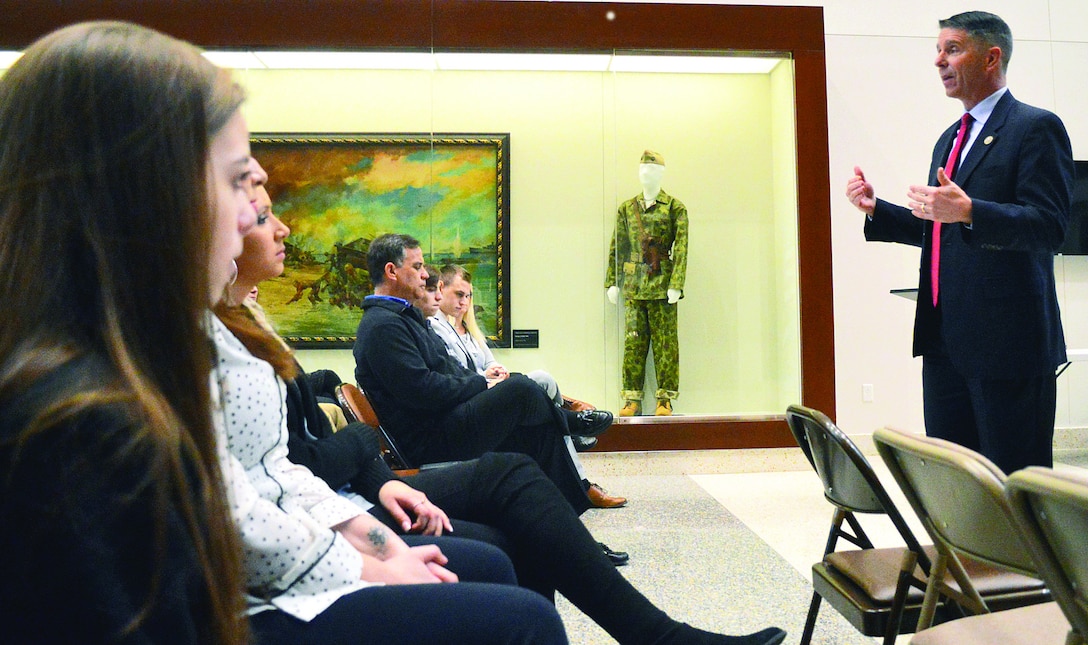 Representative Rob Wittman, First Congressional District of Virginia, congratulates students on their nominations to service academies during a reception at Marine Corps University.
