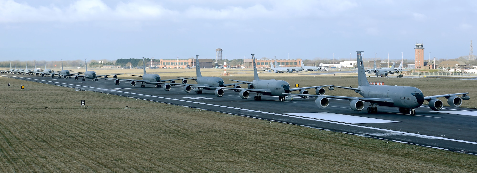 Twelve U.S. Air Force KC-135 Stratotankers assigned to the 100th Air Refueling Wing taxi down the runway at RAF Mildenhall, England, Feb. 27, 2018. The show of force maneuver demonstrates the readiness of the wing to provide global air refueling support at short notice. (U.S. Air Force photo by Senior Airman Justine Rho)
