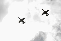 Two A-10C Thunderbolt II aircraft circle above Canadian Royal Air Force and New Zealand army joint terminal air controllers during combined training, Feb. 21, 2018, at Moody Air Force Base, Ga. Ally forces from the Canadian Royal Air Force and New Zealand army traveled to Moody AFB to train with the 75th Fighter Squadron on close air support. (U.S. Air Force photo by Staff Sgt. Eric Summers Jr.)