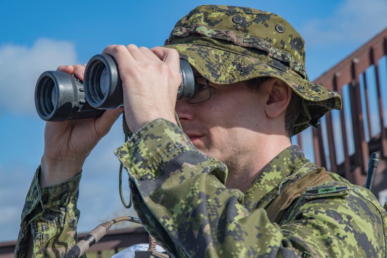Canadian Royal Air Force Warrant Officer Macintyre, joint terminal attack controller, analyses the simulated battlefield during combined training, Feb. 21, 2018, at Moody Air Force Base, Ga. Ally forces from the CRAF and New Zealand army traveled to Moody AFB to train with the 75th Fighter Squadron on close air support. (U.S. Air Force photo by Staff Sgt. Eric Summers Jr.)