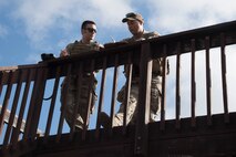 New Zealand army Capt. Price, joint terminal attack controller, gives feedback to Corporal McDonald, joint terminal attack controller, on his briefing during combined training, Feb. 21, 2018, at Moody Air Force Base, Ga.  Ally forces from the Canadian Royal Air Force and NZA traveled to Moody AFB to train with the 75th Fighter Squadron on close air support. (U.S. Air Force photo by Staff Sgt. Eric Summers Jr.)