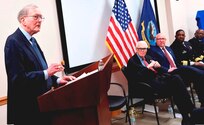 IMAGE: DAHLGREN, Va. (Feb. 22, 2018) – Retired Adm. James Hogg addresses the audience during the electromagnetic railgun line naming ceremony at Naval Surface Warfare Center Dahlgren Division, where he, along with Dr. Hans Mark, were honored. As public servants, Hogg and Mark laid the foundation for the U.S. Navy Railgun Program and led the effort to explore and illustrate to senior leadership the warfighting advantages of this game-changing technology and were pivotal in gaining the initial funding necessary to demonstrate its feasibility. (U.S. Navy photo by John F. Williams/Released)