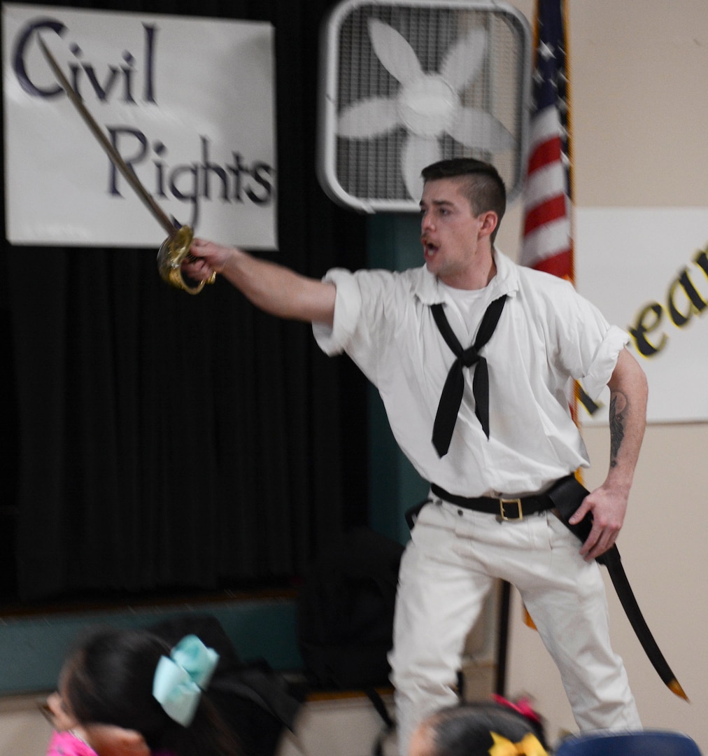 "Shall I board her, sir?" Petty Officer 3rd Class Kyle Brennan assists in the recreation of the USS Constitution verses HMS Guerriere battle Feb. 21. San Antonio is one of select cities to host a 2018 Navy Week, a week dedicated to raise U.S. Navy awareness through local outreach, community service and exhibitions.