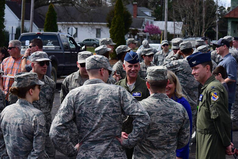 Lt. Gen. Jay Silveria, superintendent of the U.S. Air Force Academy, Colo., center, and Col. Christopher Sage, 4th Fighter Wing commander, right, talk with members of Team Seymour before game two of the 2018 Freedom Classic, Feb. 24, 2018, at Grainger Stadium in Kinston, North Carolina. The Falcons lost the series against the Midshipmen 2-1. (U.S. Air Force photo by Airman 1st Class Kenneth Boyton)