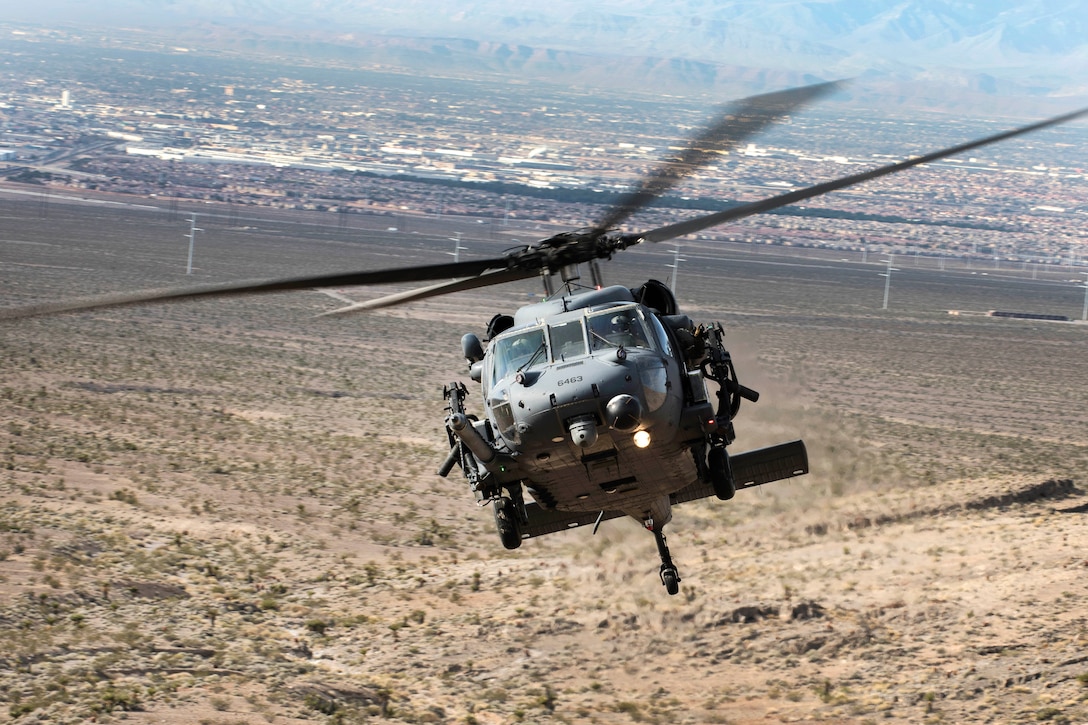 An HH-60G Pave Hawk helicopter flies during personnel recovery training.