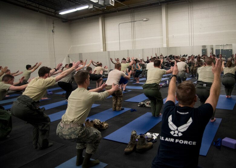 58th Special Operations Wing Airmen perform yoga at a performance skills workshop at Kirtland Air Force Base, N.M., Feb. 12. The workshop is a monthly battery of instruction being offered to students so they can be the best version of themselves.