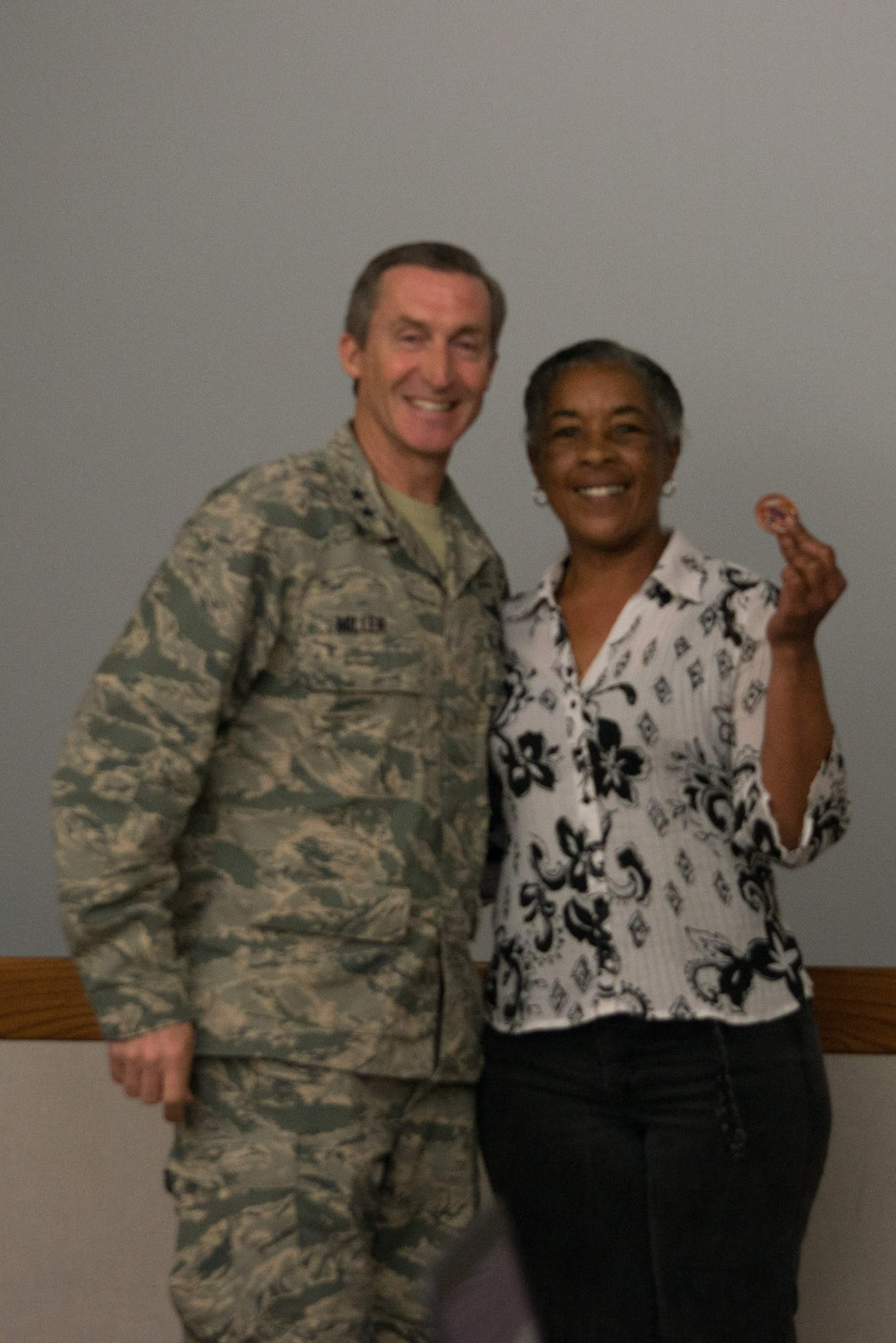 Carolyn F. Laguer, 482nd Force Support Squadron, received a coin from Tenth Air Force Commander, Maj. Gen. Ronald B. “Bruce” Miller in recognition of her contribution to the conference.