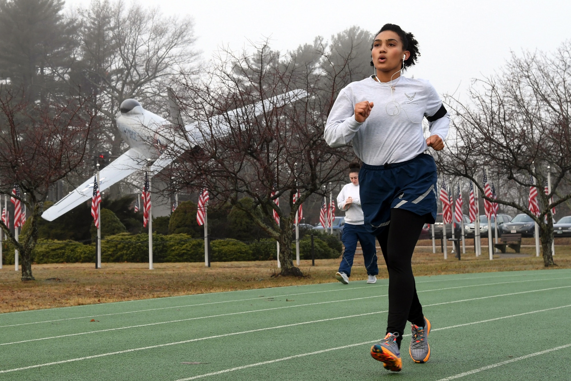 Airmen exercise on base track