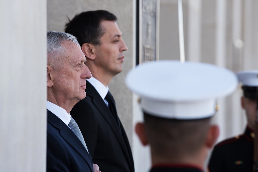 Defense Secretary James N. Mattis stands next to the Montenegrin defense minister.