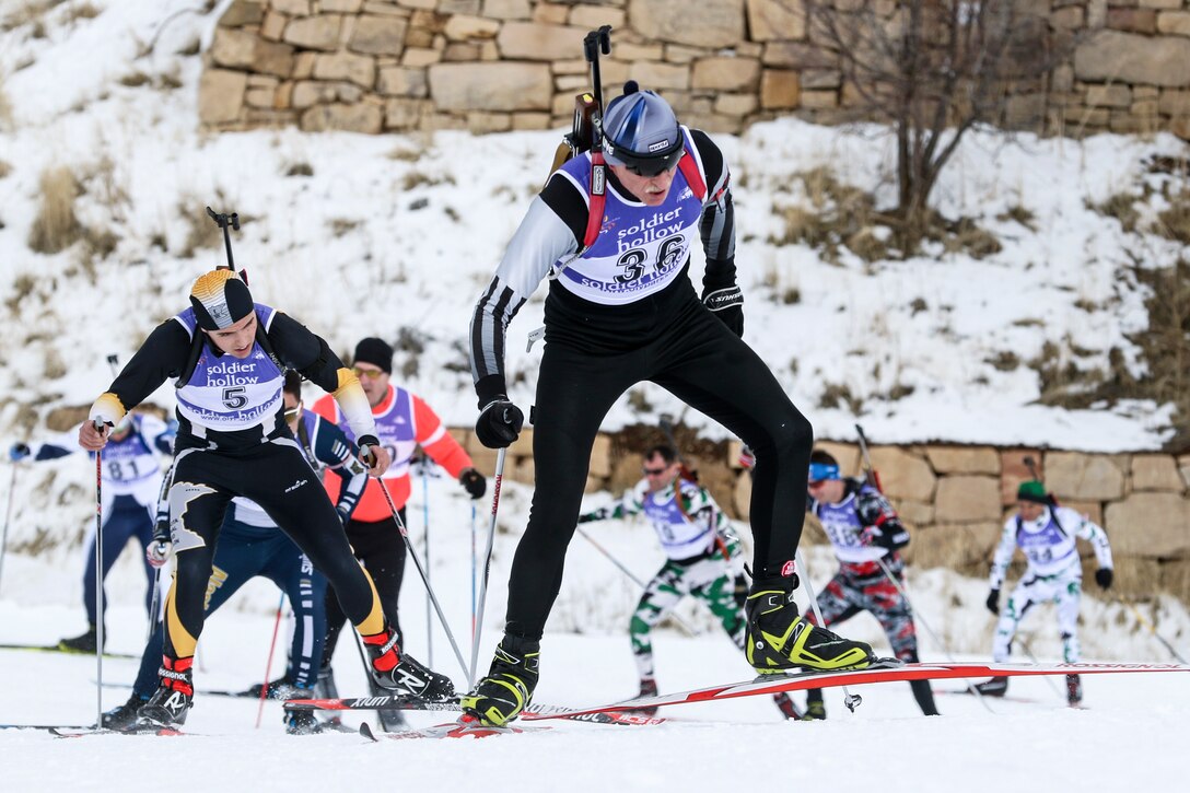 Participants compete in a cross-country skiing event
