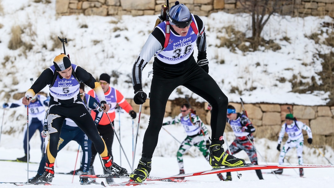 Participants compete in a cross-country skiing event