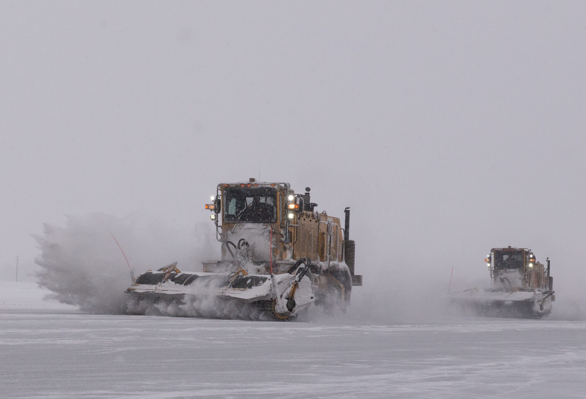 Members of the 773d Civil Engineer Squadron Snow Barn remove snow from the flightline at Joint Base Elmendorf-Richardson, Alaska, Feb. 22, 2018. Earlier this year the Snow Barn team was recognized for their dedication and hard work when their team was awarded the Balchen/Post Award for the best military snow removal team in the Air Force for the 2016-2017 winter season.
