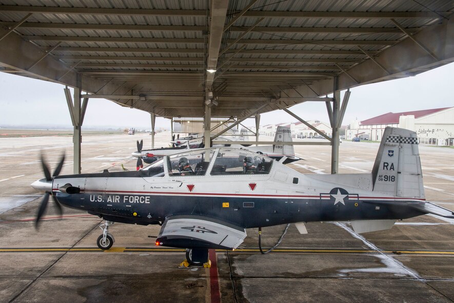 U.S. Air Force Maj. Gen. Patrick Doherty, 19th Air Force commander, and Maj. Lincoln Olsen, T-6 instructor pilot, conduct a T-6 Texan II safety check before conducting an operational demonstration at Joint Base San Antonio-Randolph, Texas, Feb. 21, 2018. Doherty was on the flightline getting test data first-hand during the command-wide T-6 operational pause. (U.S. Air Force photo by Sean Worrell)