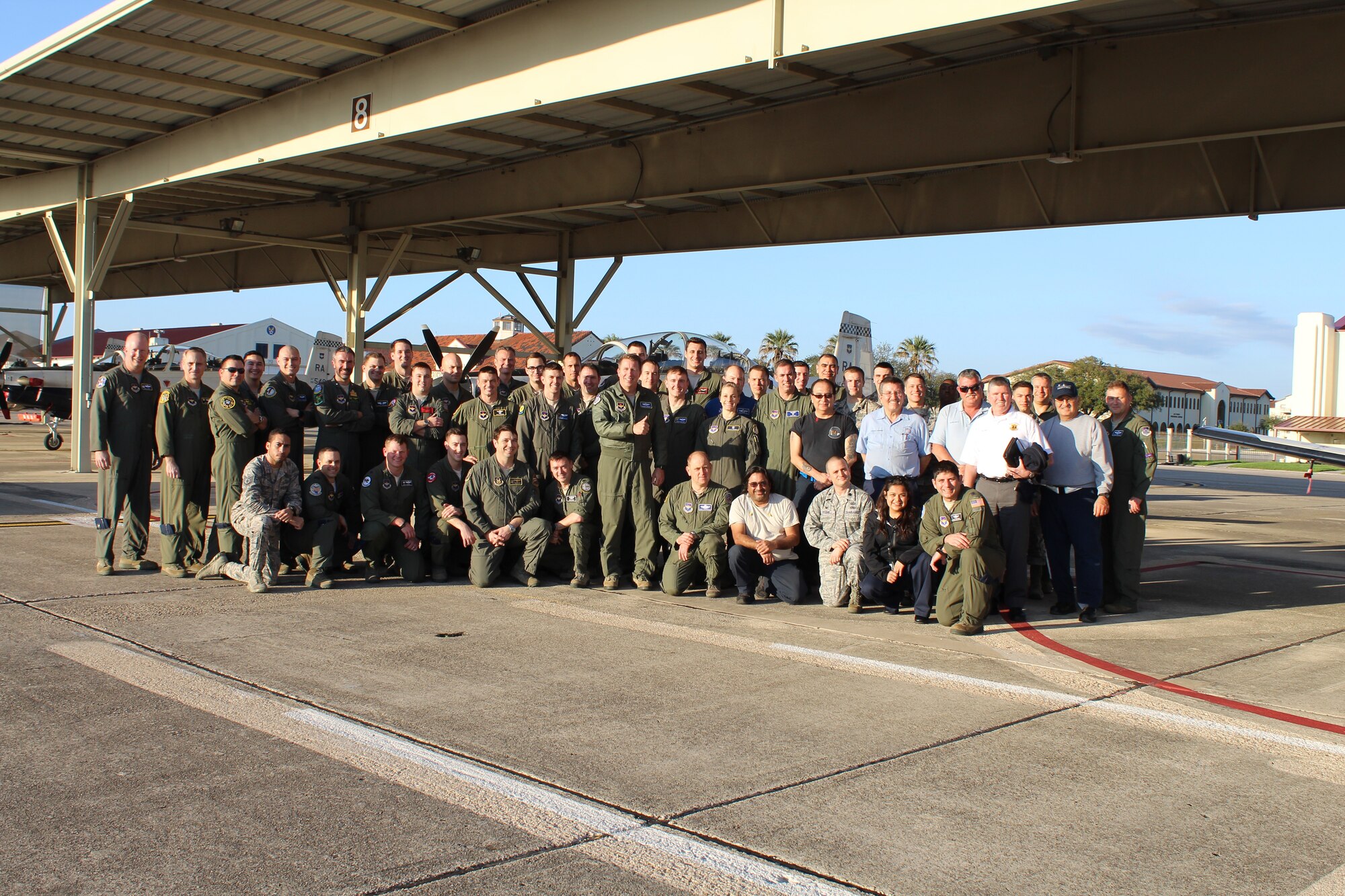 U.S. Air Force Maj. Gen. Patrick Doherty, 19th Air Force commander, and Air Education and Training Command pilots, maintainers and flight surgeons, plus NASA personnel gather for a photograph during the command’s collection and analysis of operational flight test data at Joint Base San Antonio-Randolph.  The T-6 operational pause which began Feb. 1 was lifted Feb. 27.  Following the incidents, a team including experts from the Air Force, Navy, NASA, and medical specialties, came together to aggressively capture and analyze data from the pilots who had experienced physiological events and the aircraft. Collaboration with Navy officials allowed 19th Air Force officials to gain insights and lessons learned from similar events in the T-45 Goshawk. (Courtesy Photo)