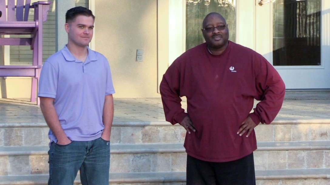 Marine Sgt. Bryan Weber, left, and former Marine Dave Ford, right, take in the sunset in the backyard of a colleague’s house in Jacksonville, Fla., Feb. 22. Weber, out of a desire to help a fellow Marine, donated his kidney to Ford, who was on dialysis for more than three years while waiting for a possible donor match. Both work for Blount Island Command in Jacksonville. (Photo by Staff Sgt. Jayson Price)