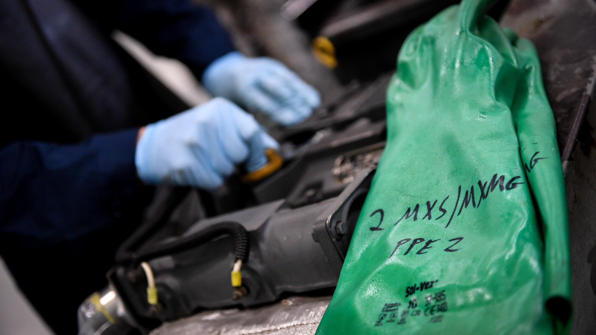 Airman 1st Class Jared Fayard, 2nd Maintenance Squadron aerospace ground equipment technician, finalizes a bomb loader vehicle engine oil inspection at Barksdale Air Force Base, La., Feb. 27, 2018. Bomb loader vehicles or "jammers" are used daily during flight line operations to load munitions onto the B-52 Stratofortress.