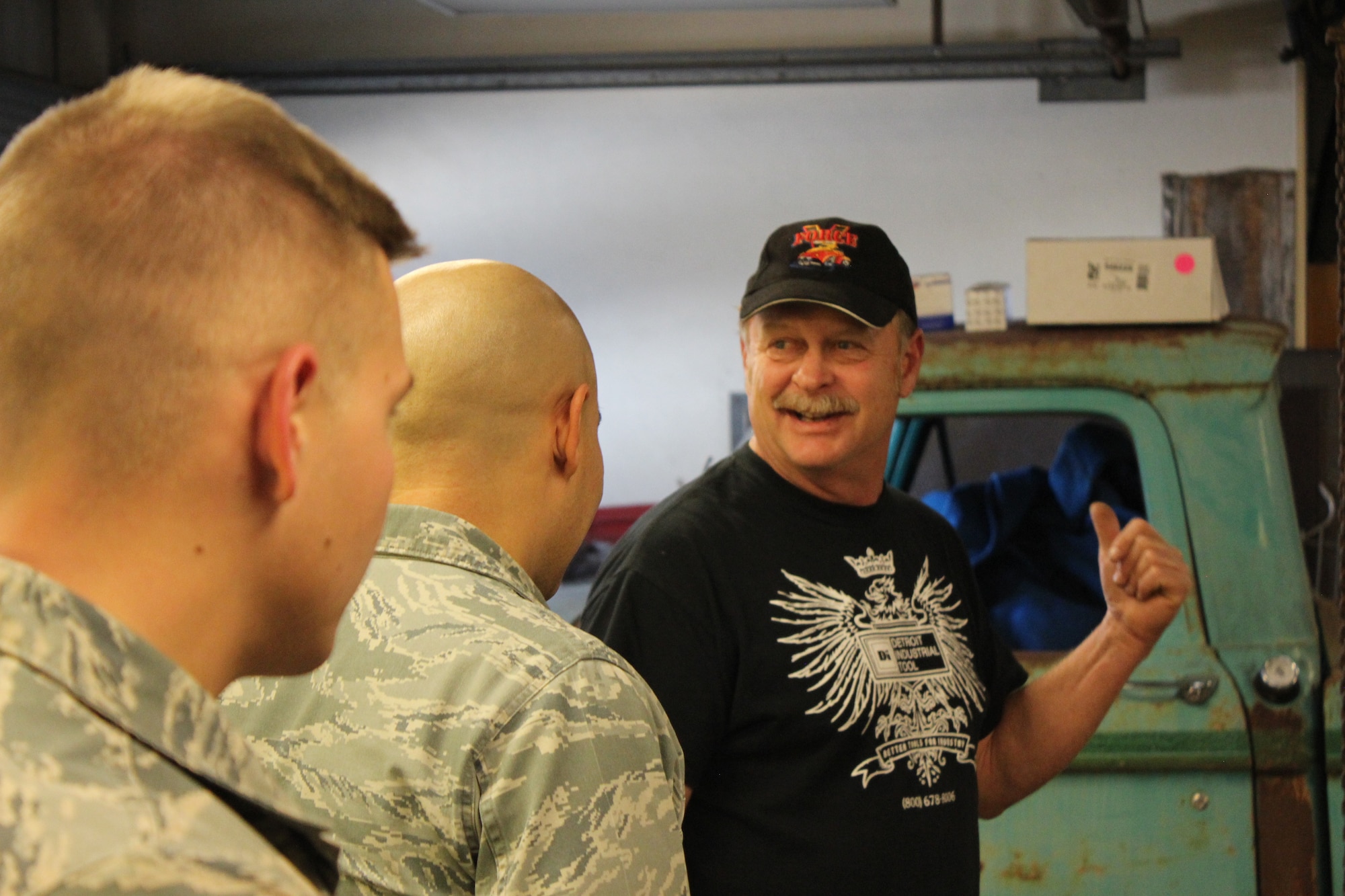 Dirk Starbuck, 30th Logistics Readiness Squadron honorary commander, gives Airmen a tour of his muffler shop, Feb. 1, 2018, Lompoc, Calif. (Courtesy Photo)