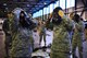 521st Air Mobility Operations Wing Airmen don gas masks during a chemical, biological, radiological, and nuclear training session on Ramstein Air Base, Germany, Feb. 16, 2018. The 721st Air Mobility Operations Group conducted a training day which included CBRN skills, self-aid buddy care, and risk management. (U.S. Air Force photo by Senior Airman Joshua Magbanua)