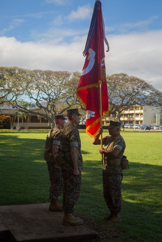 Sgt. Maj. Emilio Hernandez delivers the unit color.