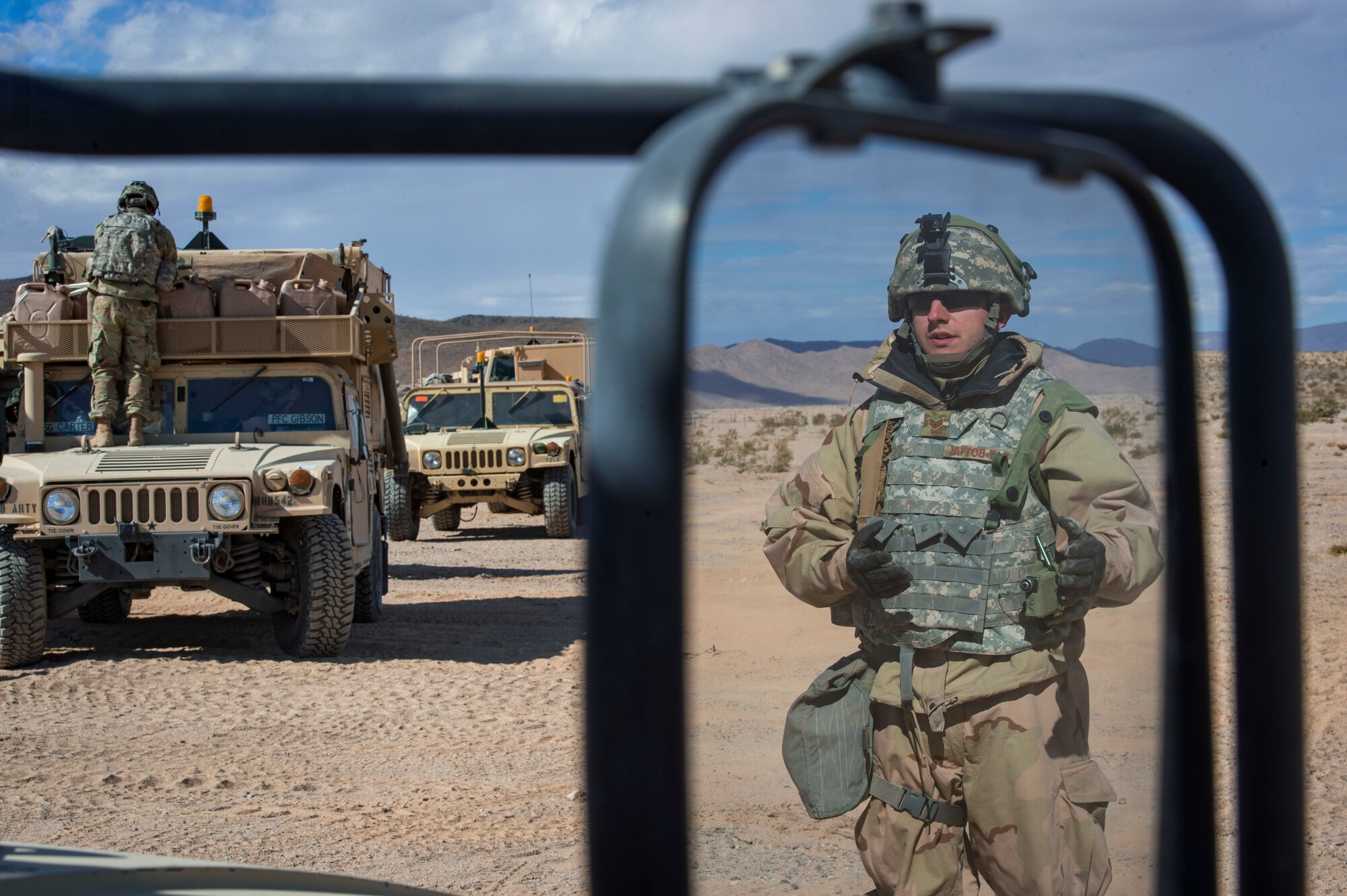 U.S. Air Force Staff Sgt. Kristopher Day-Bottai, 3d Air Support Operations Group weather forecaster, discusses the importance of providing Army assets with accurate weather during an interview for pre-deployment training at Ft. Irwin, California’s National Training Center, Feb. 21, 2018. During their month-long NTC rotation, Air Force weather assets from the 93d Air Ground Operations Wing advised, trained and assisted Army units to exploit weather and environmental conditions as they battled mock adversaries. As the Army’s sole weather support asset, the training maximized integration in a hostile environment to enhance interoperability and assure mission success. (U.S. Air Force photo by Senior Airman Greg Nash)