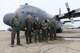 Crew members stand with Col Jeffrey Van Dootingh, Commander of the 911th Airlift Wing, after returning from his final flight with the 911th Airlift Wing February 13, 2018. Van Dootingh has been a navigator for almost 33 years, and is taking a new position as director of staff at the 22nd Air Force, Dobbins Air Reserve Base, Ga. (U.S. Air Force photo by Senior Airman Beth Kobily)
