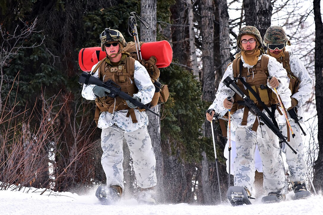 Marines maneuver along Hippie Trail to range.