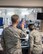 U.S. Air Force Maj. Gen. Dondi E. Costin, Chief of Chaplains, Headquarters U.S. Air Force, waves to surgeons during his tour of David Grant USAF Medical Center at Travis Air Force Base, Calif., Feb. 22, 2018. Costin is on a two-day tour of Travis visiting several units and meeting with Airmen. (U.S. Air Force photo by Louis Briscese)