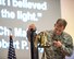 U.S. Air Force Maj. Gen. Dondi E. Costin, Chief of Chaplains, Headquarters U.S. Air Force, gives a presentation at an all call during his tour of Travis Air Force Base, Calif., Feb. 22, 2018. Costin is on a two-day tour of Travis visiting several units and meeting with Airmen. (U.S. Air Force photo by Louis Briscese)