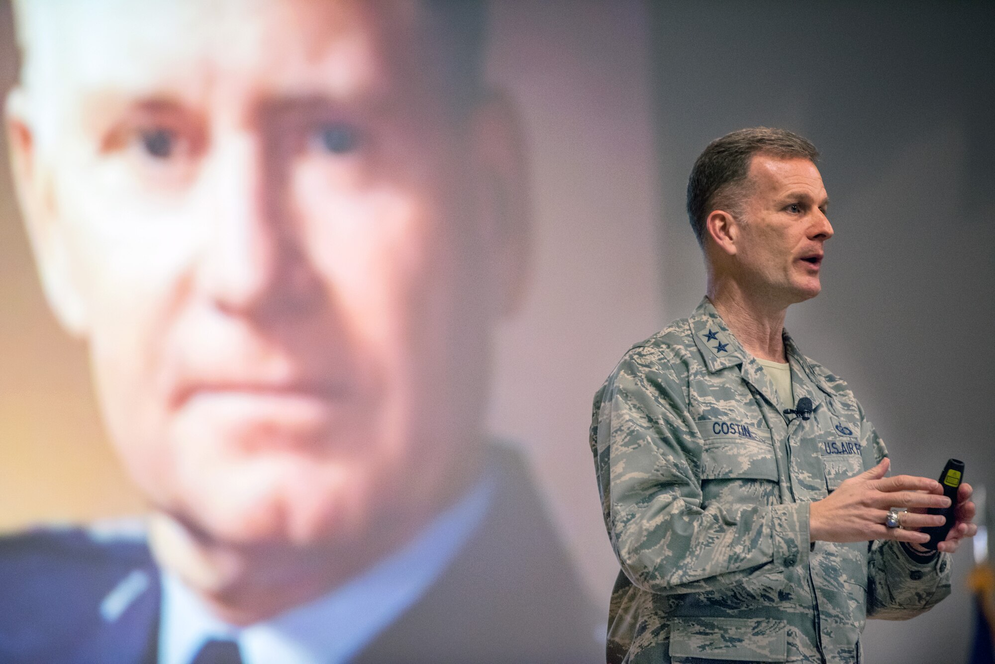 U.S. Air Force Maj. Gen. Dondi E. Costin, Chief of Chaplains, Headquarters U.S. Air Force, gives a presentation at an all call during his tour of Travis Air Force Base, Calif., Feb. 22, 2018. Costin is on a two-day tour of Travis visiting several units and meeting with Airmen. (U.S. Air Force photo by Louis Briscese)