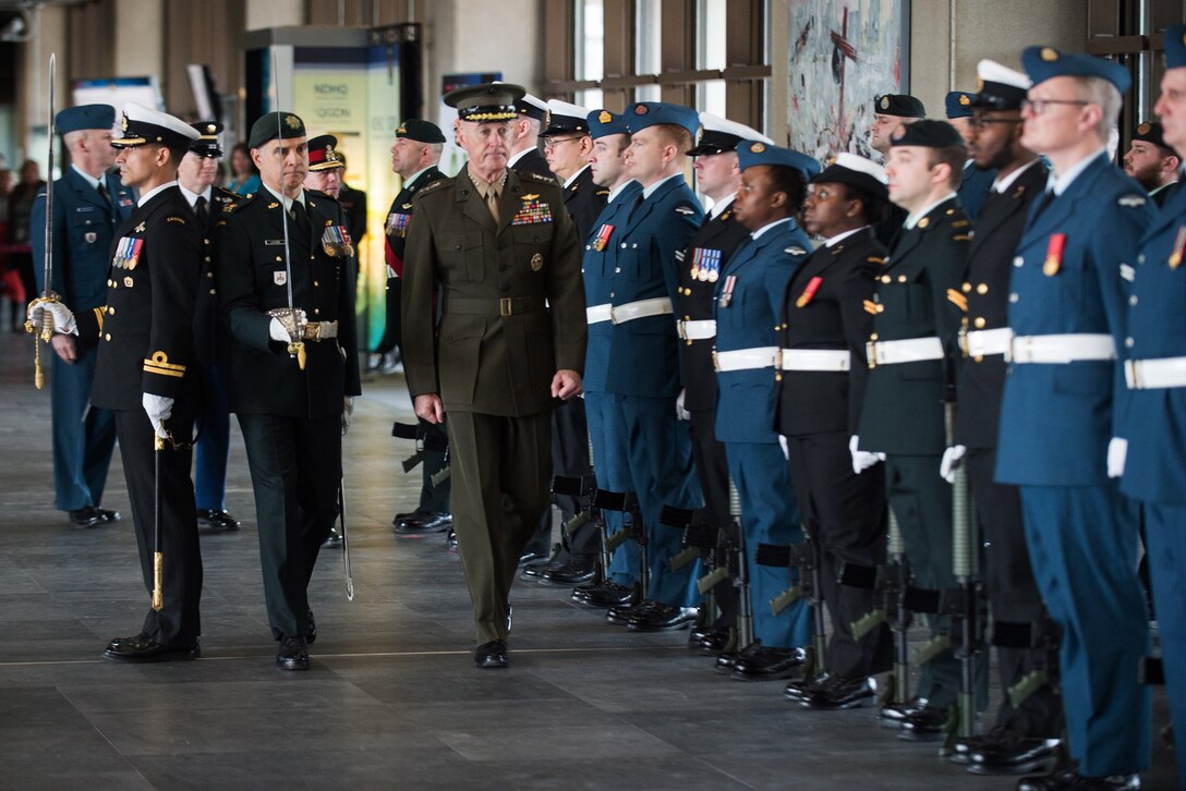 Marine Corps Gen. Joe Dunford inspects members of the Canadian Honor Guard in Ottawa, Canada.