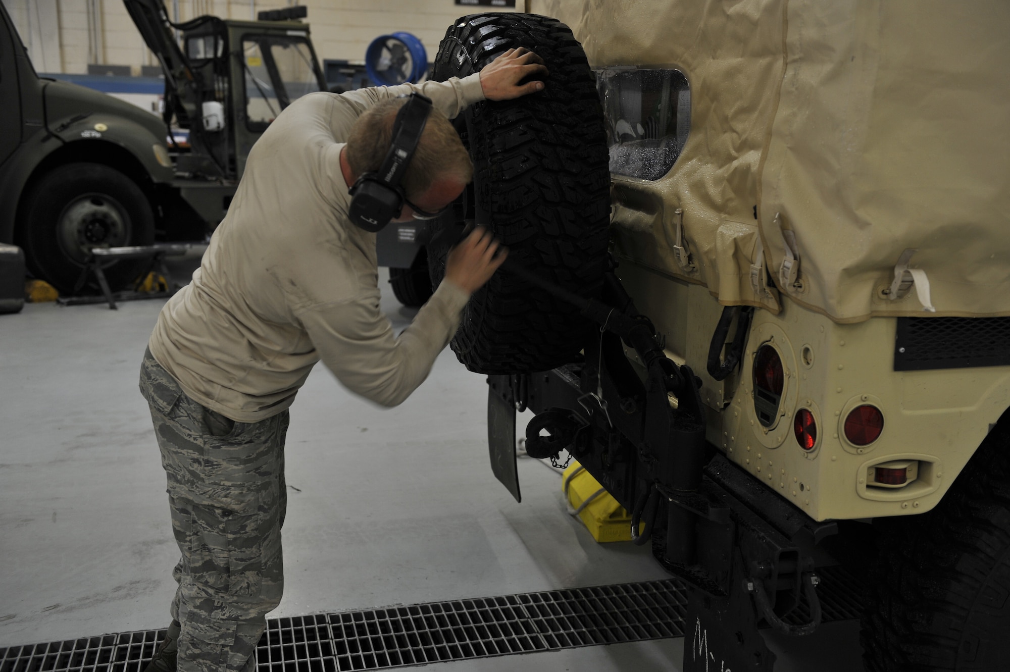 Senior Airman Braxton Willoughby, 628th Logistics Readiness Squadron vehicle maintenance journeyman, completes a vehicle check as part of mobility exercise Bold Eagle Feb. 26, 2018, at Joint Base Charleston, S.C.
