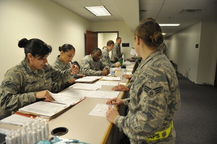 Airmen participating in readiness exercise Bold Eagle simulate a deployment process with various base agencies Feb. 27, 2018, at Joint Base Charleston, S.C.