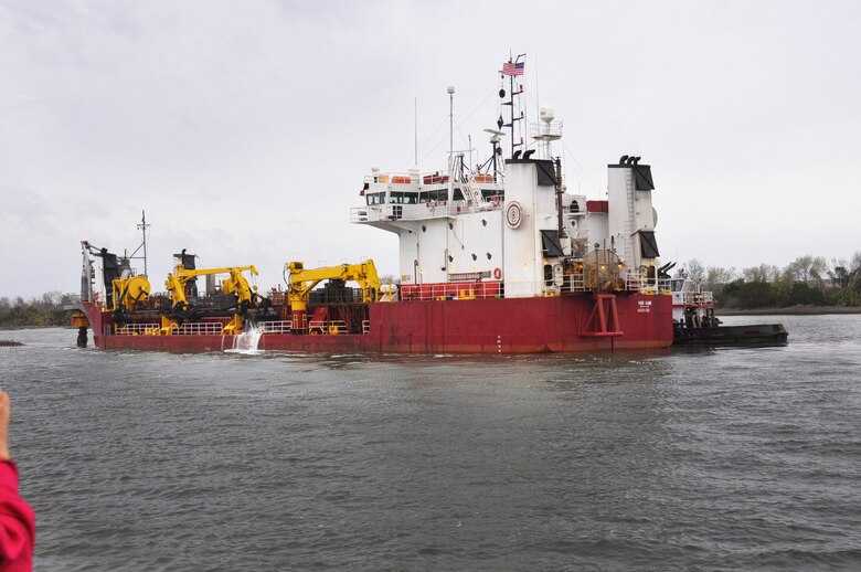 The Dredge Padre Island discharges one of the last loads of material dredged from the outer Savannah harbor to mark the end of deepening for the oceanside of the Savannah Harbor Expansion Project (SHEP). The Savannah District of the U.S. Army Corps of Engineers manages the expansion of the Savannah harbor. The deepening of the outer channel marks another major milestone in the $973 million project to deepen the harbor from 42 feet to 47 feet. Approximately 12 million cubic yards of material were removed to make this portion of the shipping channel deeper. The outer channel deepening was completed ahead of schedule and under budget. U.S. Army Corps of Engineers photo by Billy Birdwell.