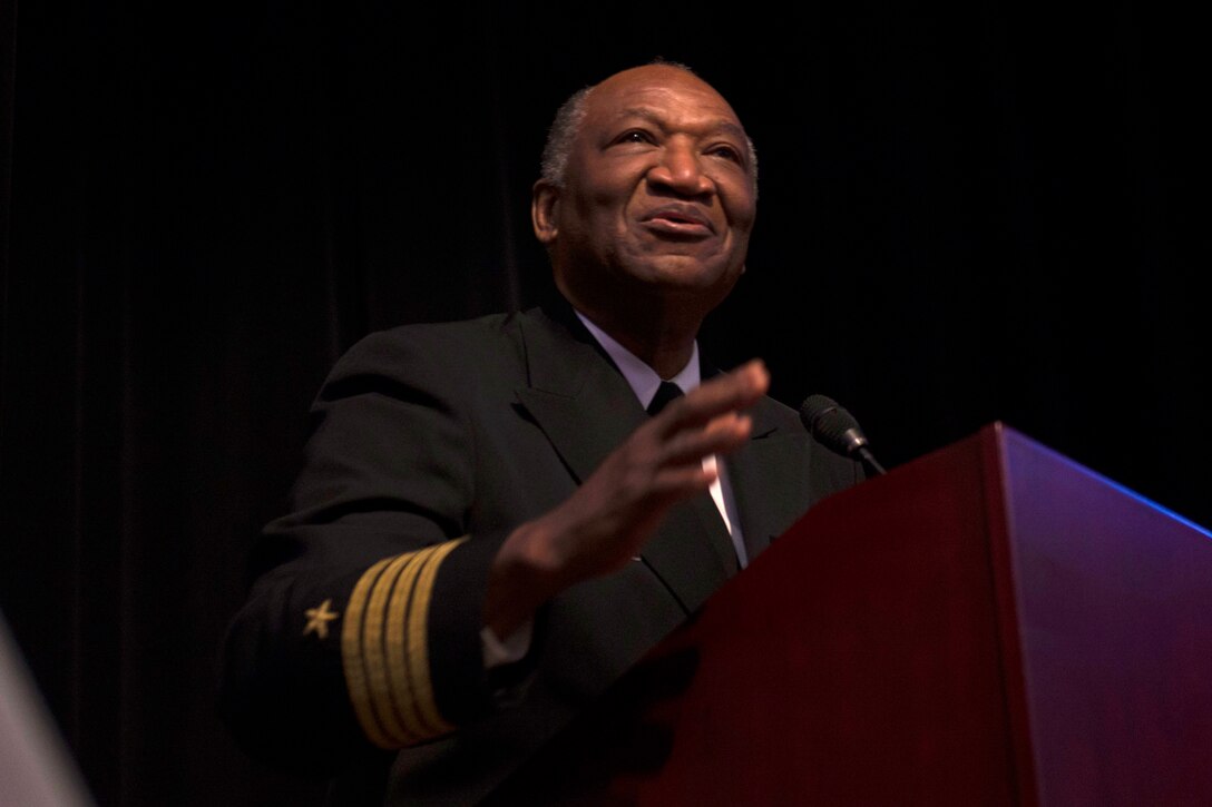 Retired U.S. Navy Capt. Edward W. Gantt speaks at a Black History Month ceremony at Joint Base Langley-Eustis, Virginia, Feb. 23, 2018. The guest speaker and performers supported the 2018 theme of "African-Americans in Times of War." (U.S. Air Force photo by Airman 1st Class Monica Roybal)