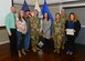 Volunteer of the Quarter award recipients pose for a photo