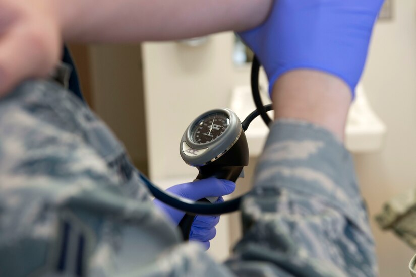 Cardiopulmonary laboratory technicians use a sphygmomanometer to measure patients' blood pressure at Joint Base Langley-Eustis, Virginia, Feb. 26, 2018. High blood pressure increases the risk of heart attacks and strokes. (U.S. Air Force photo by Airman 1st Class Monica Roybal)