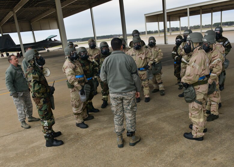 U.S. Air Force Airmen receive feedback from an exercise inspector at Joint Base Langley-Eustis, Virginia, Feb. 26, 2018.
