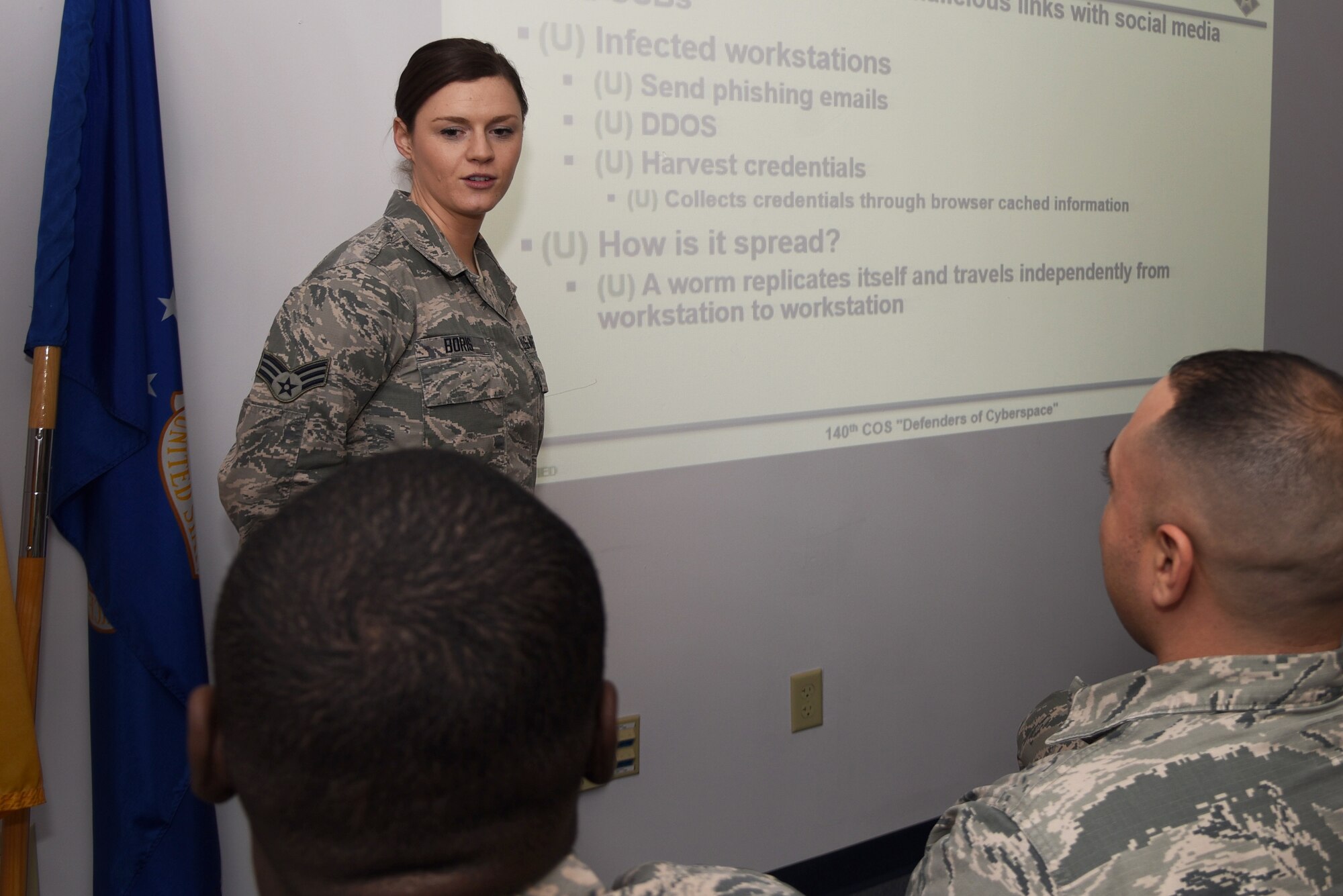 Senior Airman Erin Boris, an intelligence analyst with the 140th Cyper Operations Squadron, briefs Airmen on the importance of cyber security Feb. 13, 2018, at Joint Base McGuire-Dix-Lakehurst, N.J. Boris specializes in performing research and analysis for cyber threats and delivering intelligence products to cyber protection teams. (U.S. Air National Guard photo by Senior Airman Julia Santiago)