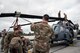 Airmen from the 723d Aircraft Maintenance Squadron (AMXS), align the rotor of an HH-60G Pavehawk, Feb. 27, 2018, at Moody Air Force Base, Ga.  They were evaluated on their ability to unfold the tail and main rotors of a Pavehawk to practice making the helicopter operational in a limited amount of time. (U.S. Air Force photo by Airman Eugene Oliver)
