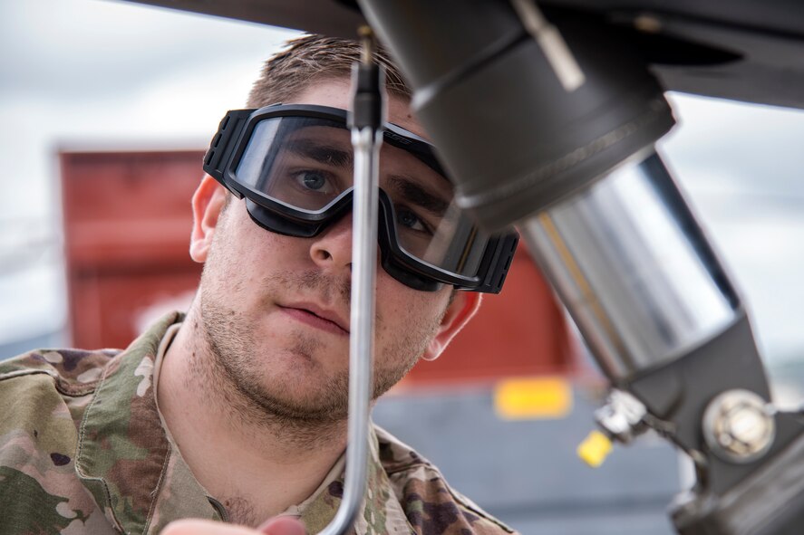 Airman 1st Class Joshua Costello, 723d Aircraft Maintenance Squadron (AMXS) crew chief, tightens a bolt onto an HH-60G Pavehawk, Feb. 27, 2018, at Moody Air Force Base, Ga.  They were evaluated on their ability to unfold the tail and main rotors of a Pavehawk to practice making the helicopter operational in a limited amount of time. (U.S. Air Force photo by Airman Eugene Oliver)