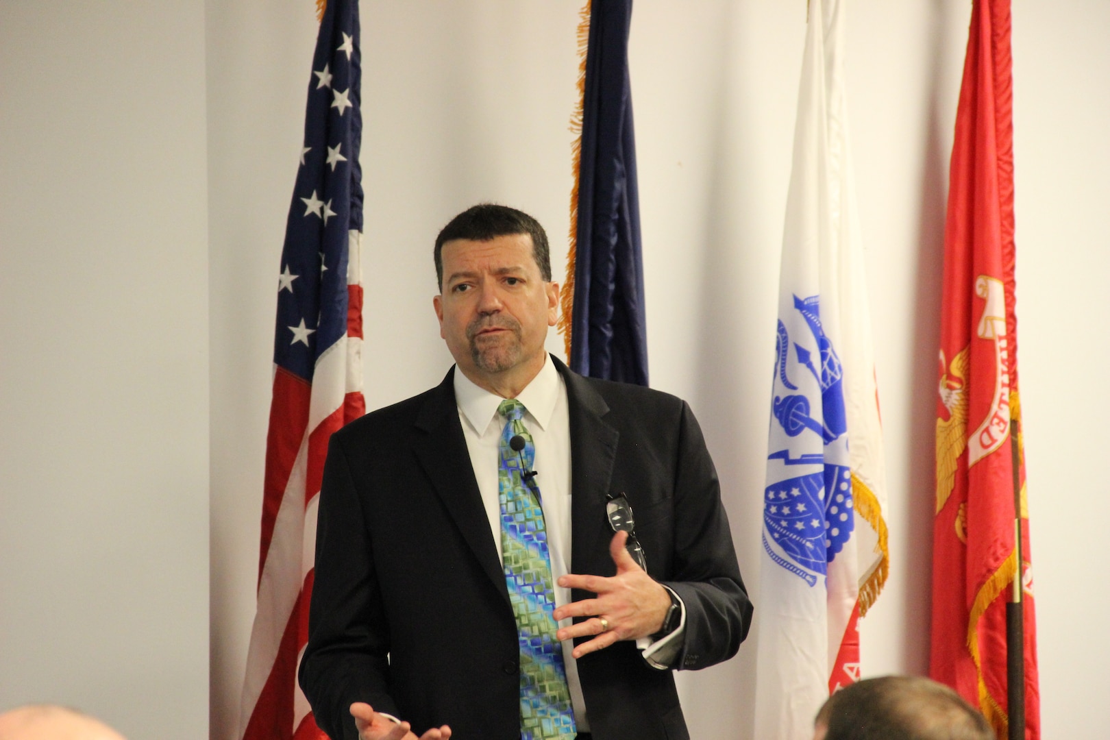 CRANE, Ind. - Mr. Jim Smerchansky, SES, Executive Director of NAVSEA speaks to Crane employees during an all-hands meeting at NSWC Crane.