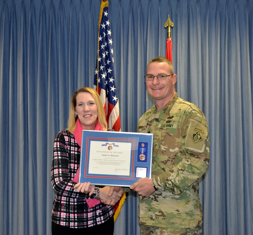 ALBUQUERQUE, N.M. – District commander Lt. Col. James Booth recognizes Jamie Howard, chief, Lakes and Assets Branch, as the District’s Supervisor of the Year during the District’s 2017 Annual Award Presentations, Dec. 8, 2017.