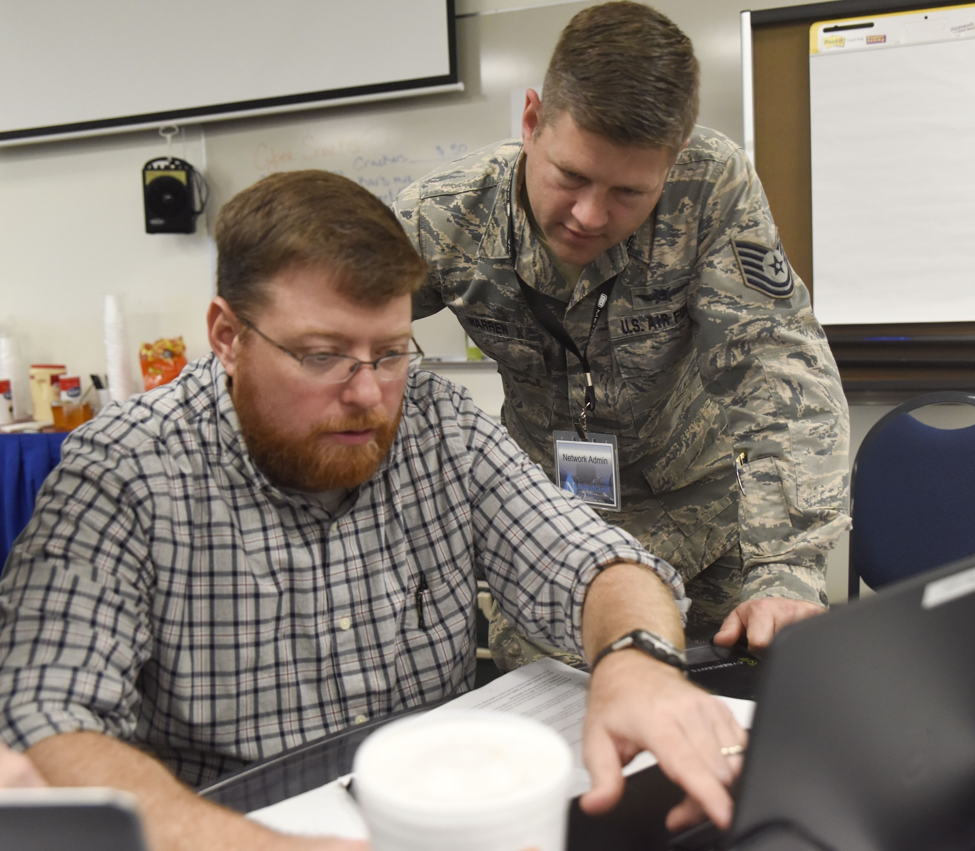 The three-day training course gave participants the opportunity to work within a simulated environment created specifically to assist cyber operators at IT managers with mitigating the risk of a cyber attack. (U.S. Air National Guard photo by Senior Airman Kayla K. Edwards)