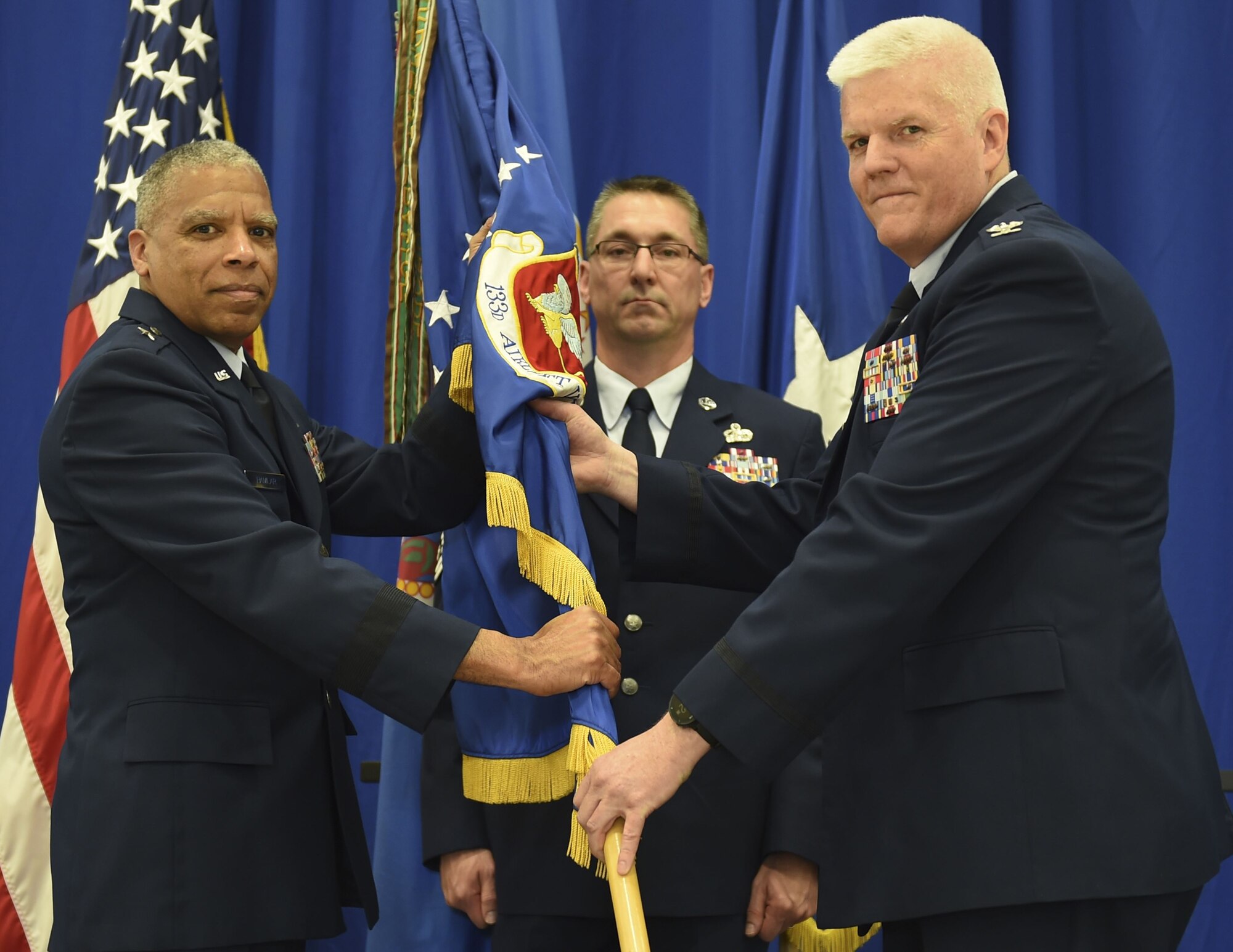 U.S. Air Force Col. James Johnson, relinquished command of the 133rd Airlift Wing to Brig. Gen. David Hamlar, Assistant General Air National Guard, in St. Paul, Minn., Apr. 16, 2016.