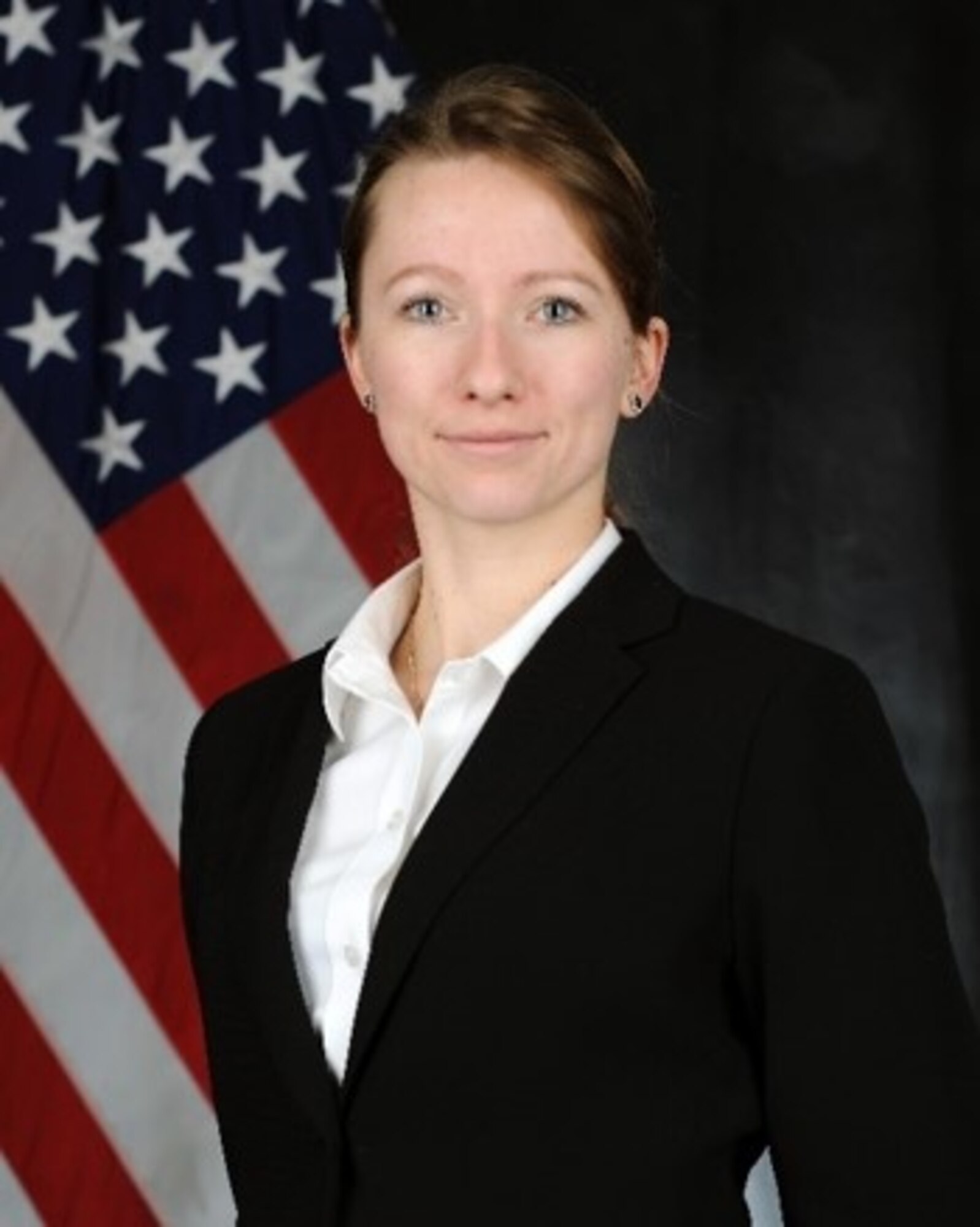 AFOSI SA Margarita Balish received the NPS Superior Service Award and the AFA Award for Outstanding Air Force Student.