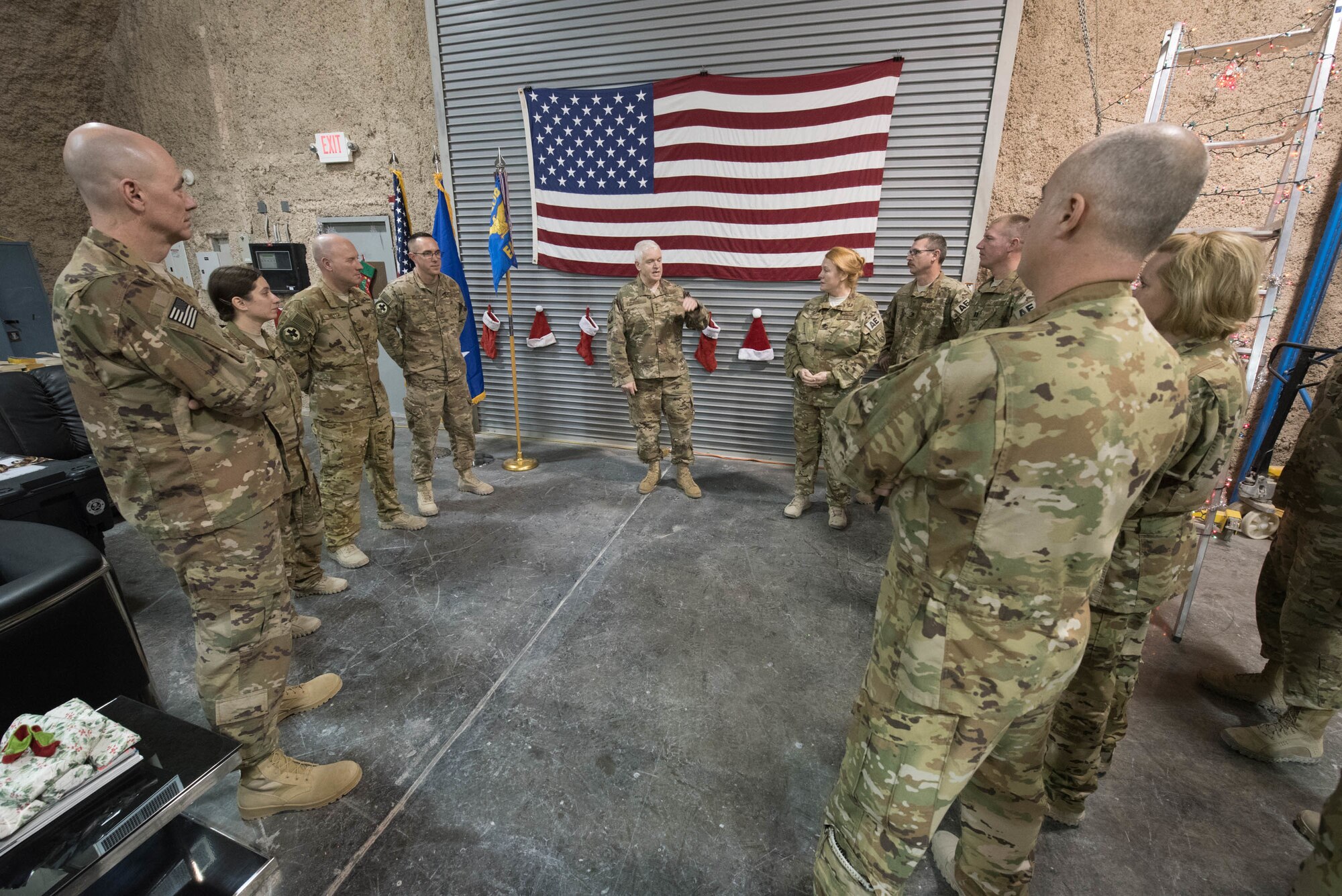 Lt. Gen. L. Scott Rice, director of the Air National Guard, speaks to members from the 379th Expeditionary Aeromedical Evacuation Squadron at Al Udeid Air Base, Qatar, Dec. 24, 2017. Rice visited deployed Air National Guardsmen at AUAB during a trip to the U.S. Central Command area of responsibility. (U.S. Air National Guard photo by Master Sgt. Phil Speck)