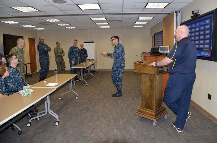 Before departing for the long holiday weekend, Naval Health Clinic Charleston hosted an Impaired Driving Month Jeoparody Challenge featuring statistics and ways to mitigate impaired driving. NHCC's Drug and Alcohol Abuse Prevention counselor, Lt. Jonathan Carmack, center, and DAPA assistant, Petty Officer 1st Class Samuel Hutcheson, right, prepared NHCC staff members for the end-of-year holiday travel period, which is often one of the most dangerous times to be on the road because of alcohol-related incidents.