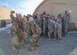 Lt. Gen. Scott Rice, director of the Air National Guard, and Chief Master Sgt. Ronald Anderson, command chief master sergeant of the Air National Guard takes a selfie with Senior Airman Morgan McCormick, 727th Expeditionary Air Control Squadron, electronic protection technician at Al Dhafra Air Base, United Arab Emirates Dec. 26, 2017. Rice texted the photo to McComick’s family and thanked them for their sacrifices and wished them a Merry Christmas. 
(U.S. Air National Guard Photo by Staff Sgt. Colton Elliott)