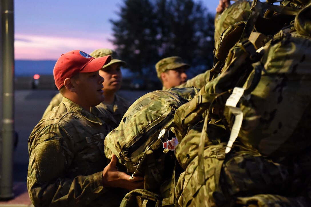 435 AEW, 86 LRS Airmen load pallets near the Ramstein Air Base flight line