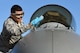 U.S. Air Force Staff Sgt. Pedro Cahua, 20th Aircraft Maintenance Squadron, 79th Aircraft Maintenance Unit, dedicated crew chief, cleans the canopy of an F-16CM Fighting Falcon before judges review the aircraft for a Proud Falcon Competition at Shaw Air Force Base, S.C., Dec. 21, 2017.
